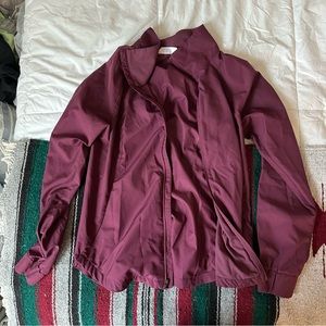 The North Face burgundy windbreaker, size S